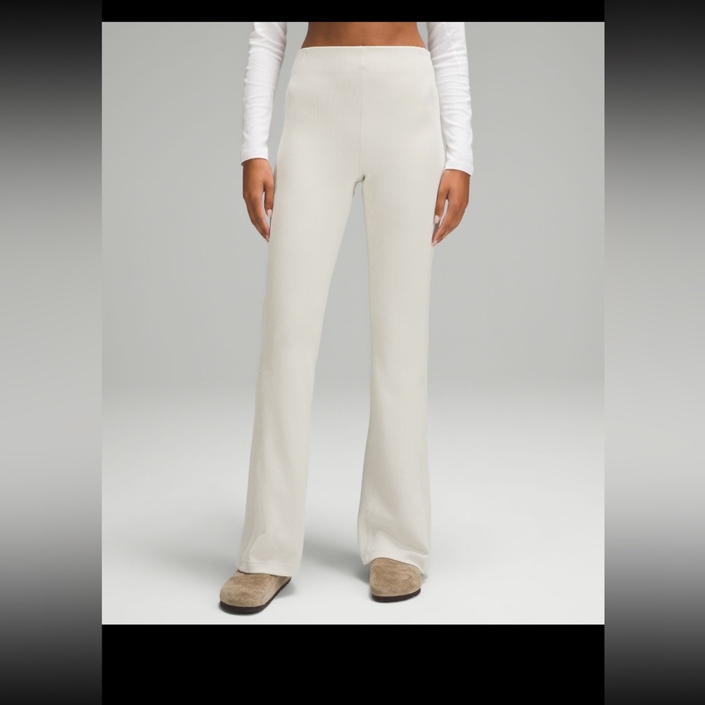 Brand New Lululemon Ribbed Softstreme Zip Flare in bone color with tag